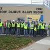 建筑管理学生组织 group photo outside Sioux Falls Public Works Building.